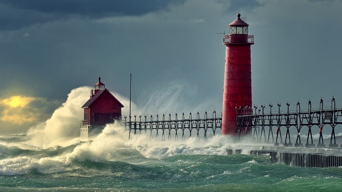 Red Lighthouses on a Pier During a Storm