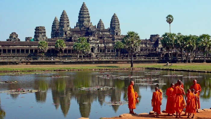 Angkor Wat with Monks and Reflection Pond