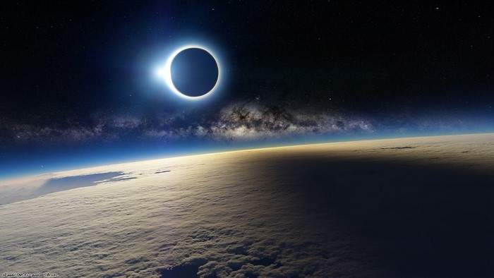 Solar eclipse over Earth with Milky Way