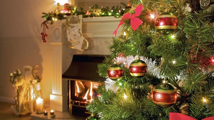 Christmas tree with ornaments and fireplace