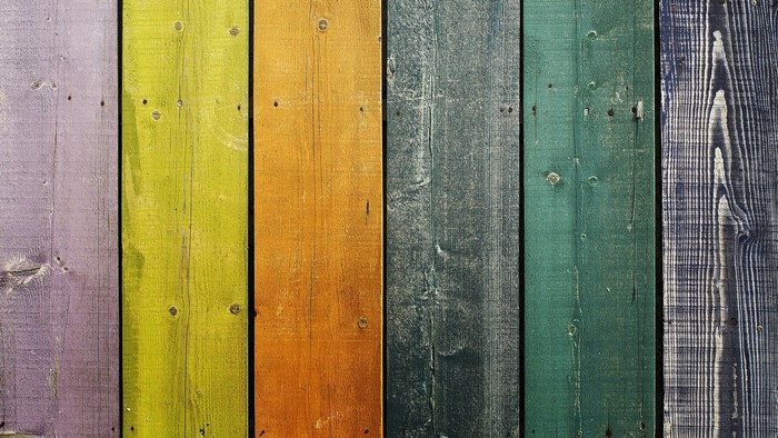 Multicolored wooden fence boards