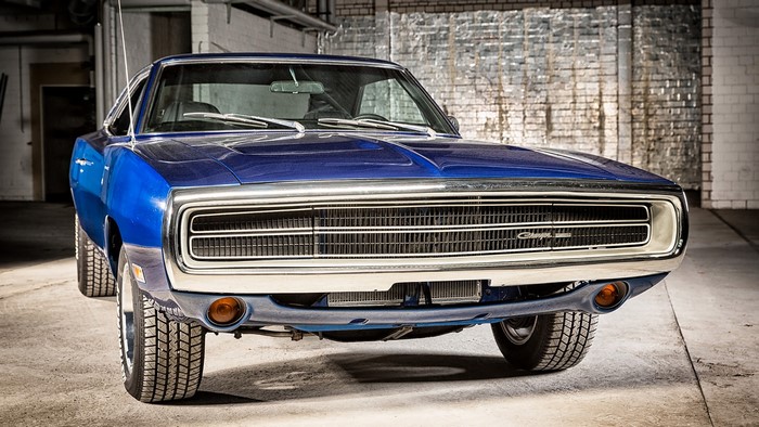Blue Dodge Charger in garage