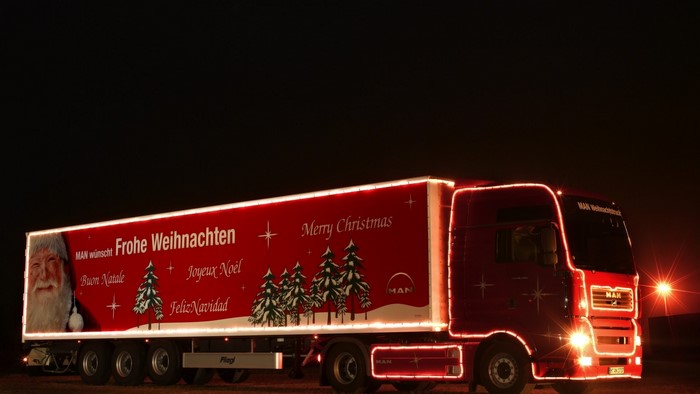 MAN Truck decorated with Christmas lights and greetings