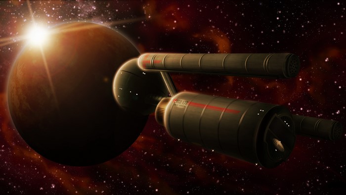 Starship Enterprise in front of a planet
