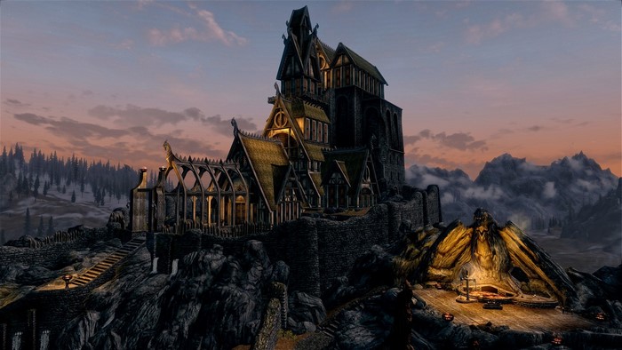 Castle on a rocky mountain at dusk
