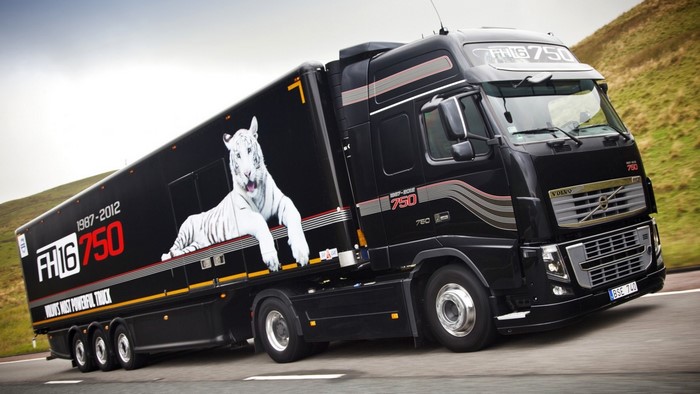 Black Volvo FH16 750 Truck with White Tiger Graphic