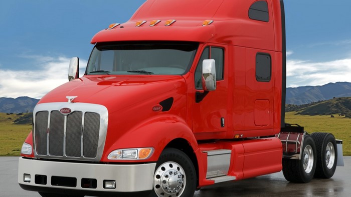 Red Peterbilt Semi-Truck in a Landscape