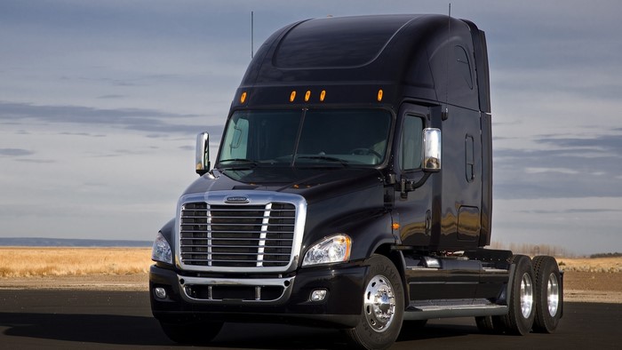 Black Freightliner Cascadia Semi-Truck
