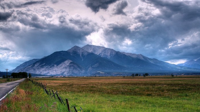 Mountain range under stormy clouds