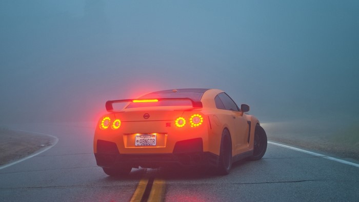 Nissan GT R on a foggy road