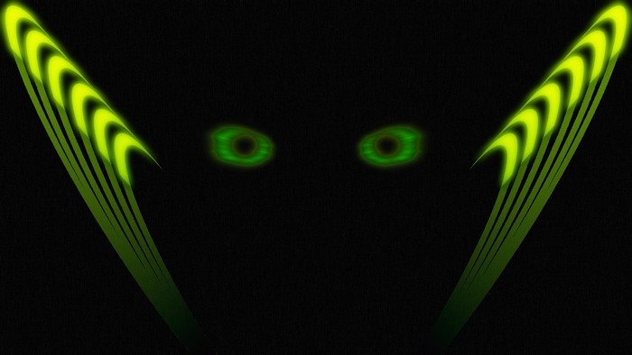 Green glowing eyes in darkness with abstract shapes