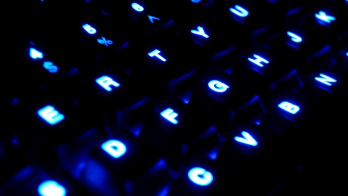 Blue glowing keyboard keys