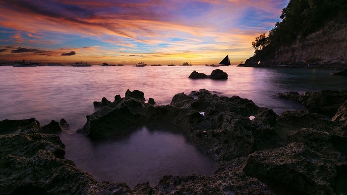 Boracay Island Sunset with Sailboat and Boats