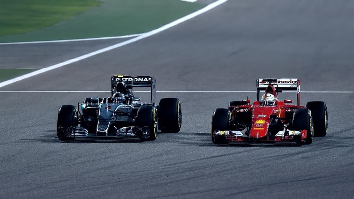 Formula 1 Mercedes and Ferrari cars racing