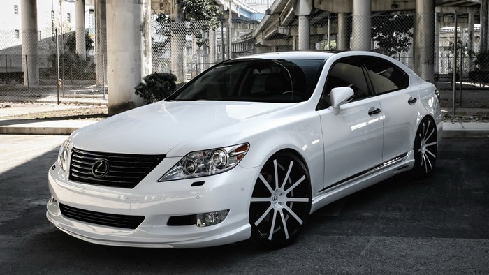 White Lexus LS with custom wheels