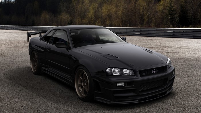 Black Nissan Skyline GT-R R34 on a Racetrack