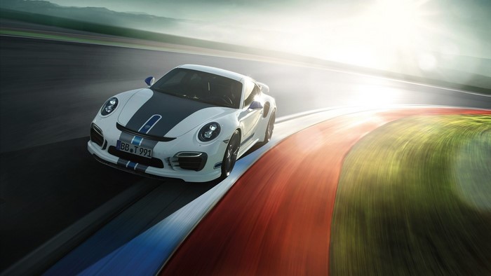 White Porsche 911 on a Racetrack