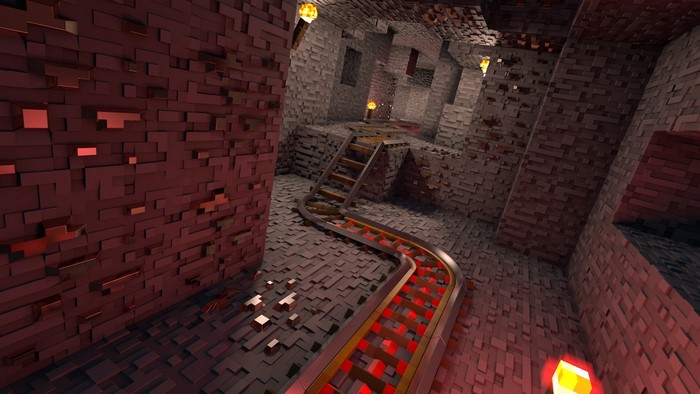 Minecraft minecart track in a blocky cave
