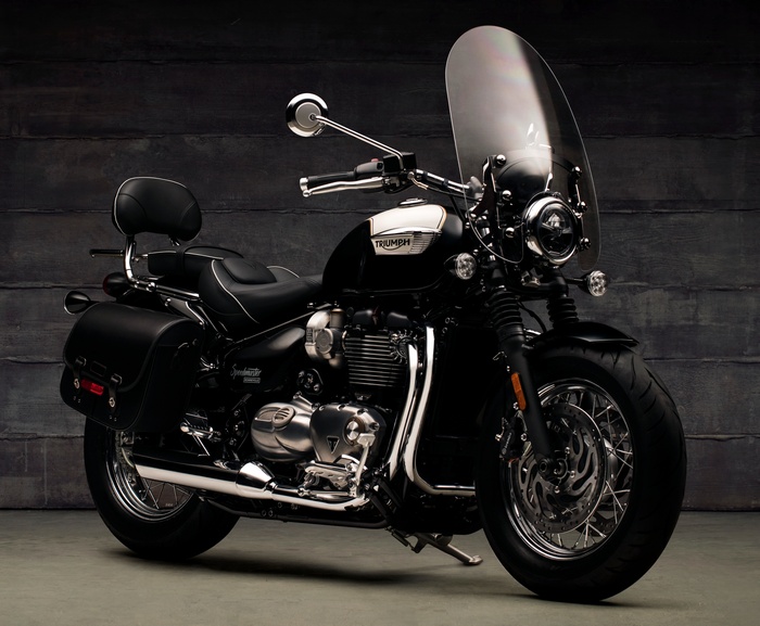 Black Triumph Bonneville Speedmaster motorcycle with windshield