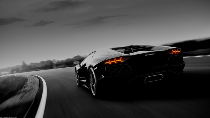 Black Lamborghini Aventador on a Road