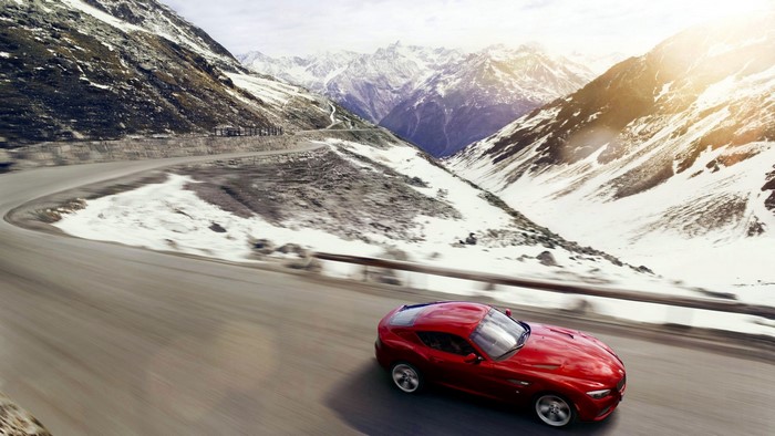 Red 2012 BMW Zagato Coupe on mountain road