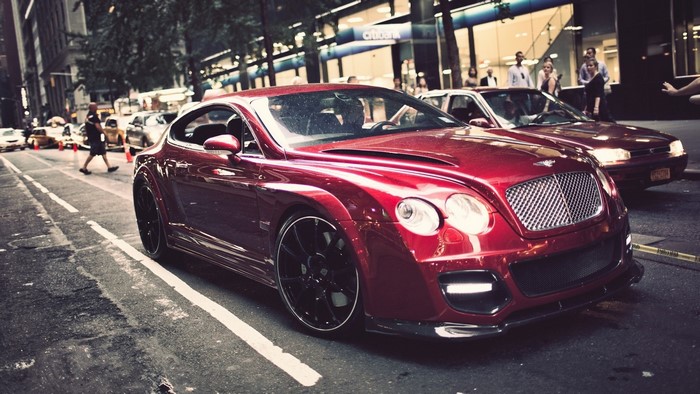 Red Bentley Continental GT on a City Street