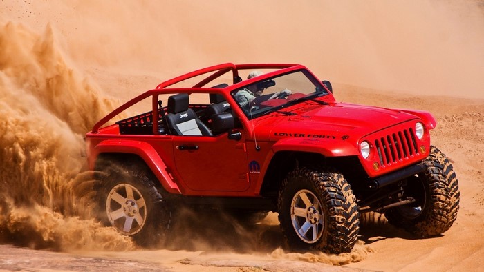 Red Jeep Lower Forty Concept driving through sand