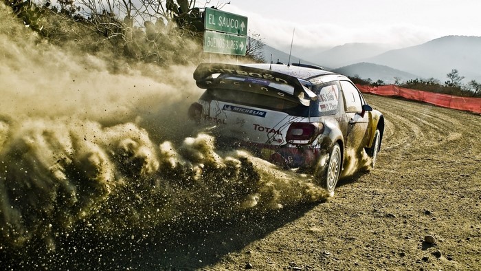 Citroen DS3 WRC Rally Car kicking up dust