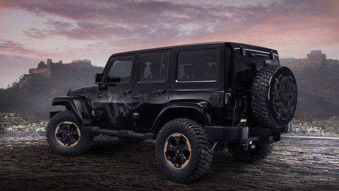 Black Jeep Wrangler with Dragon Decals near Great Wall