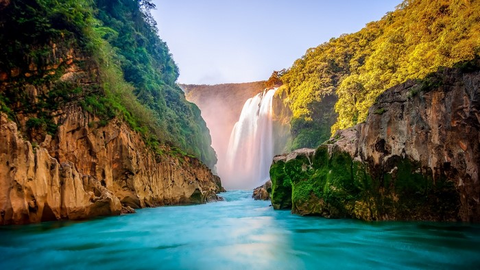 Waterfall in a Canyon with Turquoise River