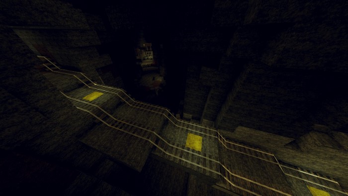 Dark cave with illuminated pathways