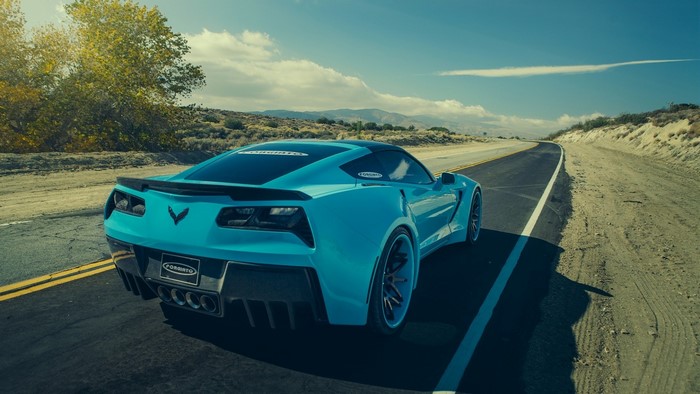 Blue Corvette on a Desert Road