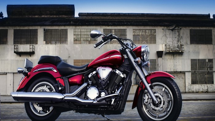 Red Yamaha XVS 1300 Midnight Star motorcycle