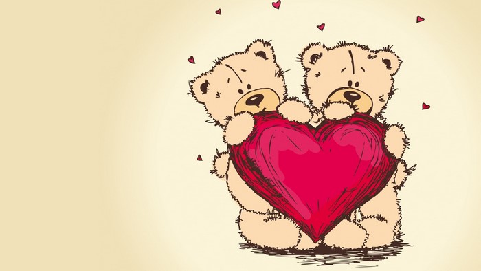 Two teddy bears holding a red heart