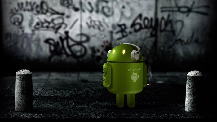Android robot with headphones and cigarette in front of graffiti