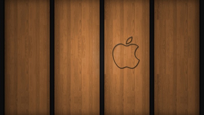 Apple logo on wood panel