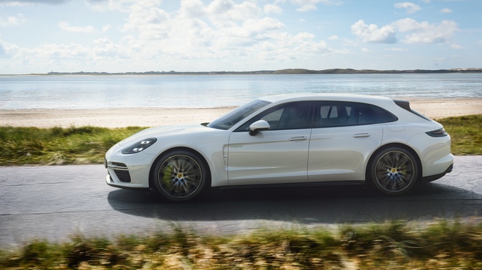 White Porsche Panamera Turbo S E-Hybrid Sport Turismo on road