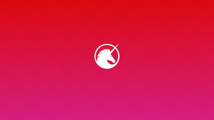 White unicorn logo on red and pink gradient background
