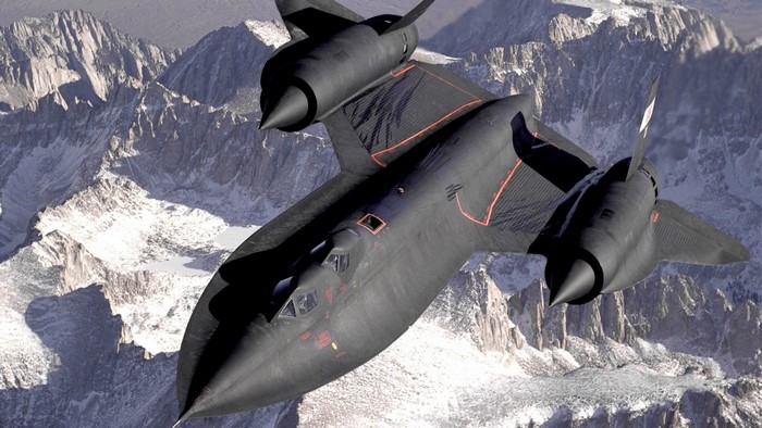 SR-71 Blackbird flying over mountains
