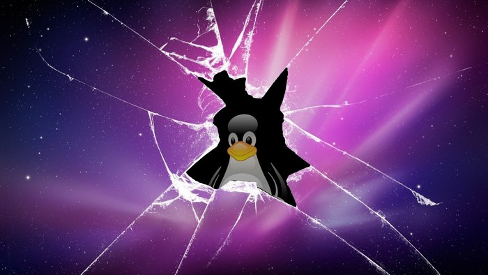 Linux Tux breaking through cracked screen