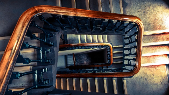 Spiral Staircase with Wooden Handrail