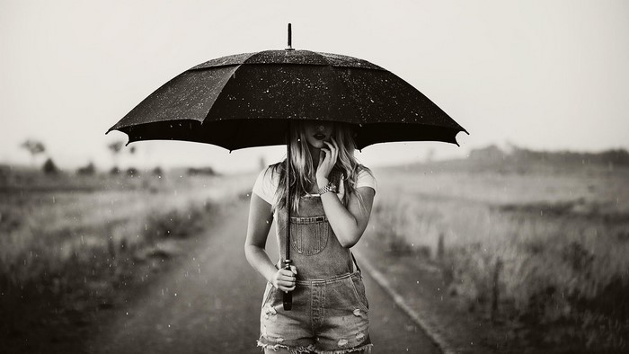 Girl with umbrella in the rain