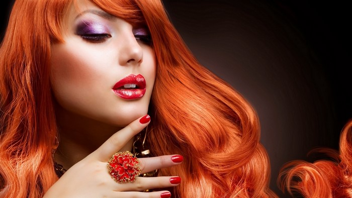 Woman with red hair and makeup