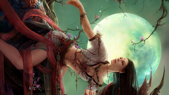 Fantasy girl with ornate jewelry under a large moon