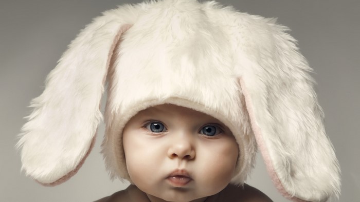 Cute Baby Wearing a White Bunny Hat