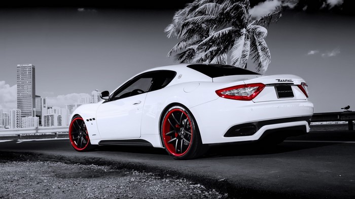 White Maserati Granturismo with red rims