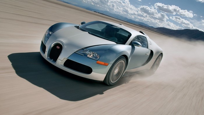 Bugatti Veyron driving on a dirt road