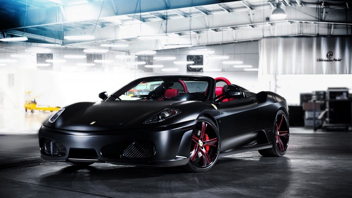 Black Ferrari F430 Spider in a Garage