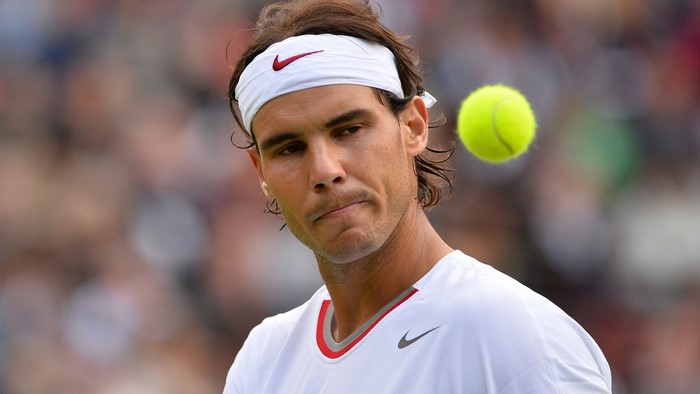 Rafael Nadal playing tennis
