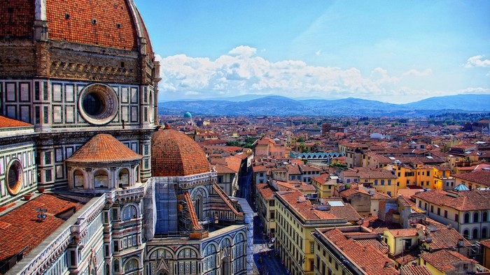 Florence cityscape with Duomo and mountains